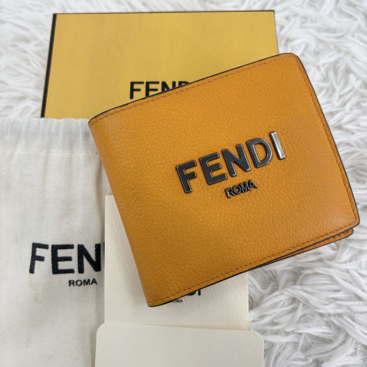 1円 FENDI フェンディ 近年モデル 折り財布 二つ折り ウォレット レザー シボ革 オレンジ FFロゴ セレリア メンズ レディース ユニセックス拍卖