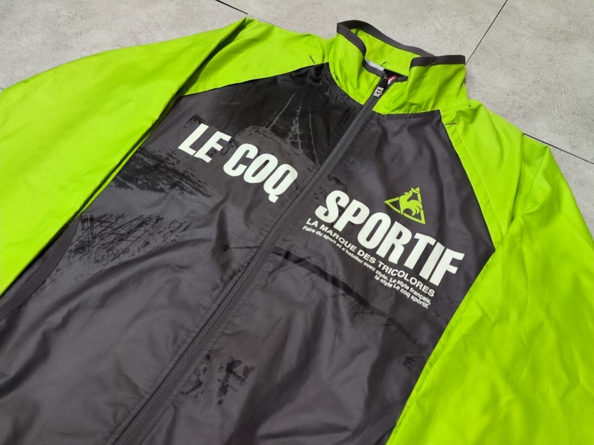 19.le coq sportif グラフィックデザイン ウーブン ウィンドブレーカー ベンチレーション ジャケット ジャンパー メンズL x907拍卖