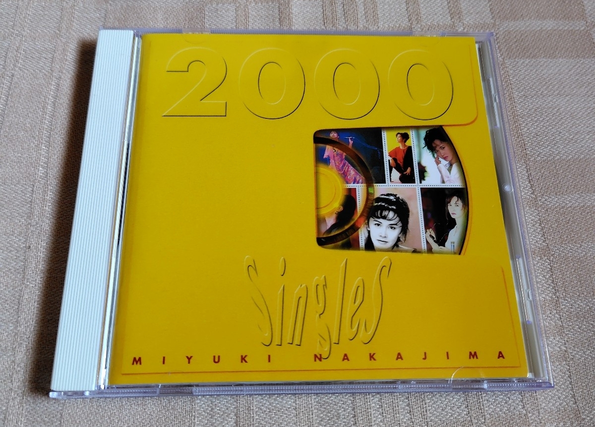 中島みゆき「シングルズ/Singles 2000」ベスト/地上の星/瞬きもせず/命の別名/糸/旅人のうた/空と君のあいだに/ファイト! 拍卖