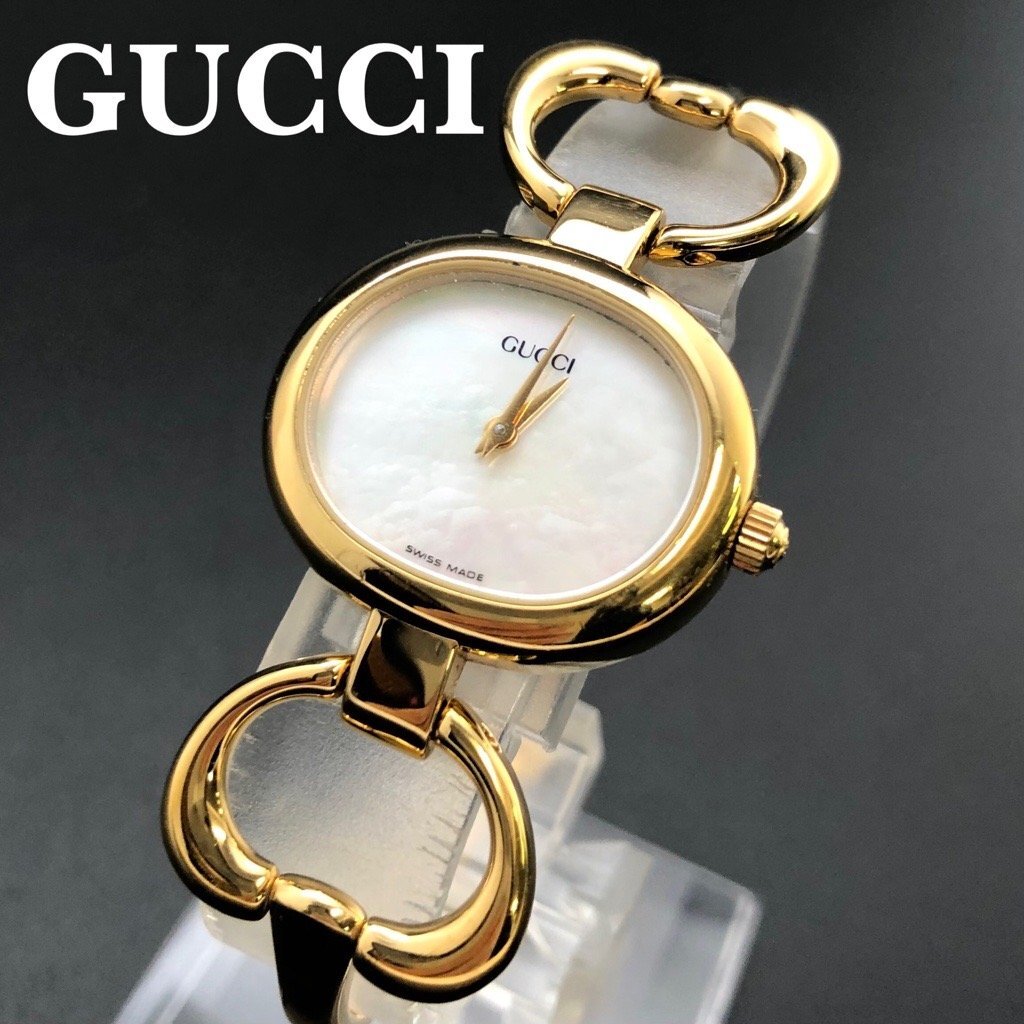 稼働品 良品 GUCCI グッチ バングル ウォッチ 1600 BT交換済 シェル文字盤 動作確認 ゴールドGP レディース 腕時計 正規品 保証 最落無拍卖
