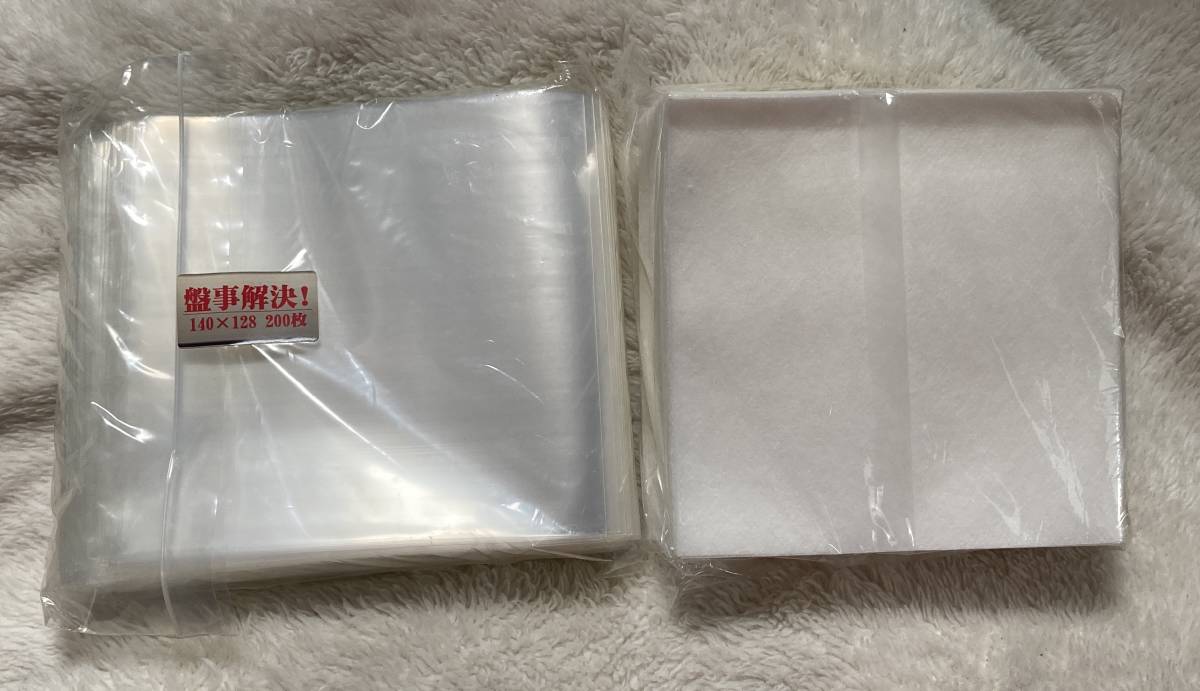 エコ&アイデア商品(15)PケースのCDが1/5以下に!バックインレイカードサイズの新品ビニール&不織布/これでCD収納が楽々♪15枚セット990円♪拍卖