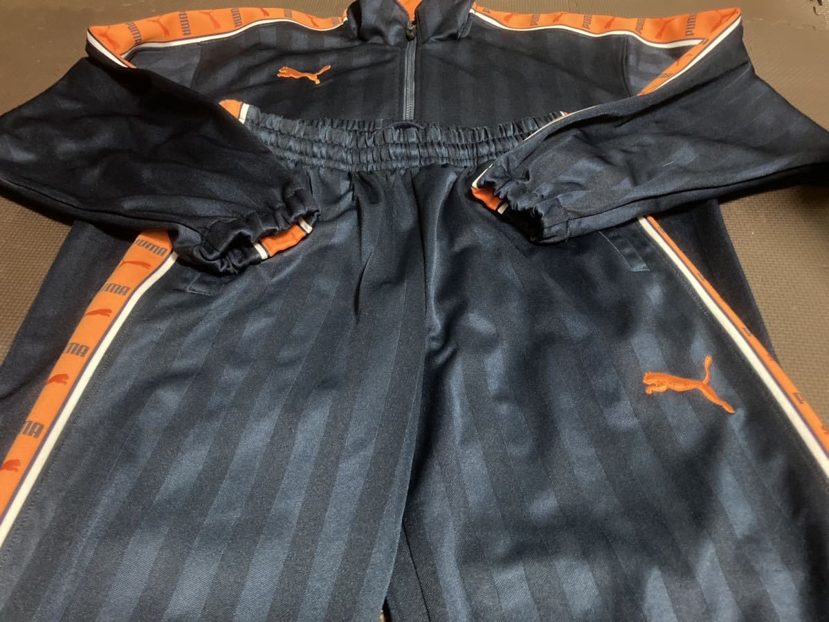 美品PUMA濃紺ストライプ、ロゴオレンジ(刺繍)肩ロゴ入り上下セット サイズSS拍卖