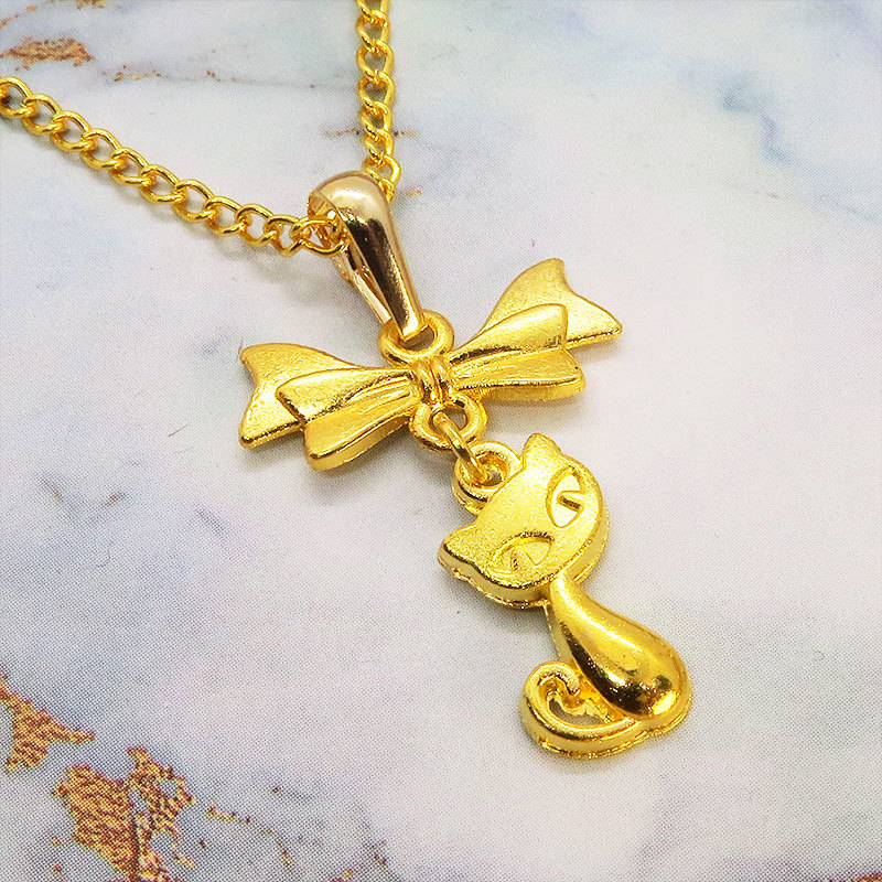 ゴールドカラーの猫とリボンのシンプルで可愛いネックレス 長さ変更可 SV925 18KGC変更可 アジャスター可拍卖