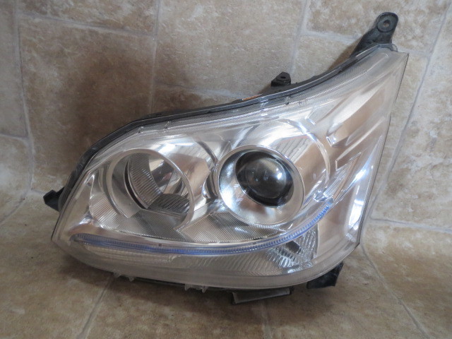 G5/ LA100Sムーヴ カスタム純正HIDヘッドライト左①KOITO 100-51060拍卖