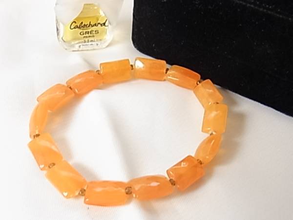 綺麗なオレンジカラー オレンジ色 プラ製のストーン風のデザインブレスレット▽拍卖