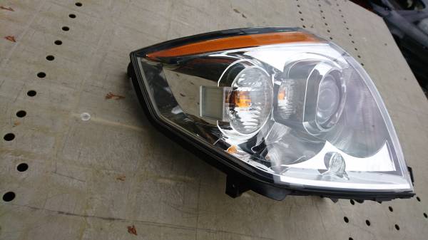 キャデラック/DTS/キセノンヘッドライト/左/LHD/25806711/32000km拍卖