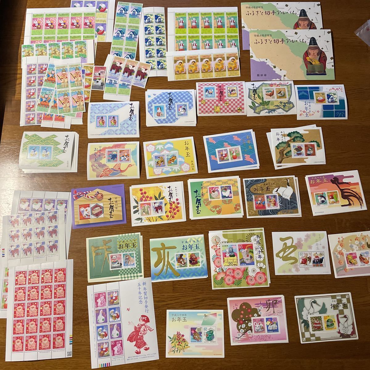 お年玉、年賀、お年玉付き切手ふるさと切手アルバムなど昭和〜平成 額面21990円拍卖