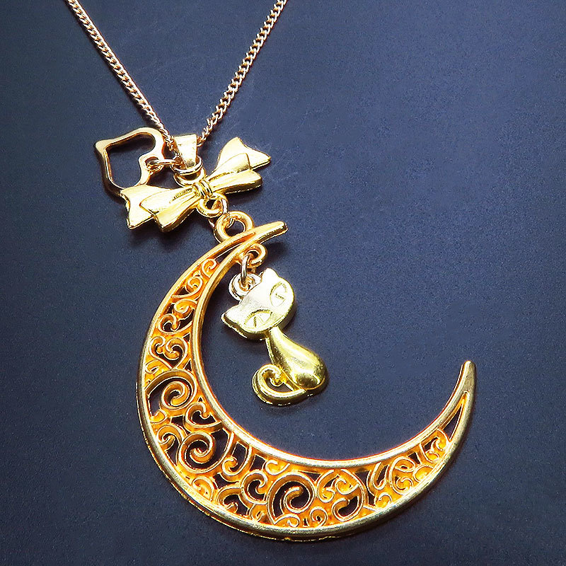 ゴールドカラーの猫と透かし三日月の大人可愛いネックレス ムーンネックレス リボン ハート拍卖
