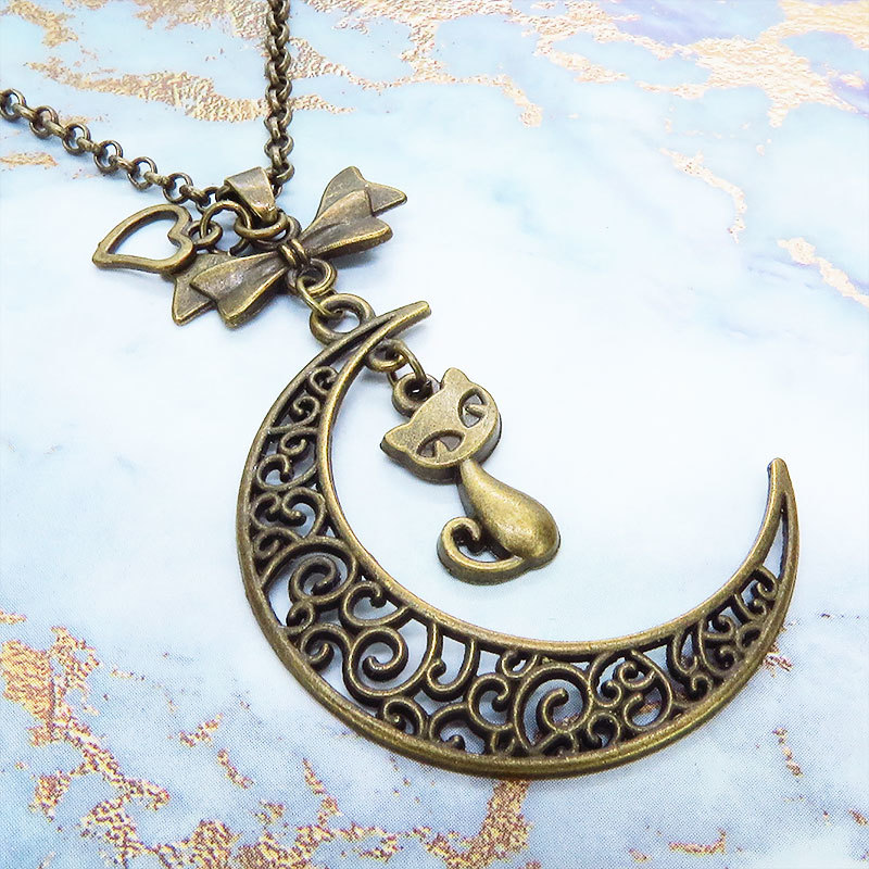 アンティークカラーの猫と透かし三日月の大人可愛いネックレス ムーンネックレス リボン ハート 金古美色拍卖
