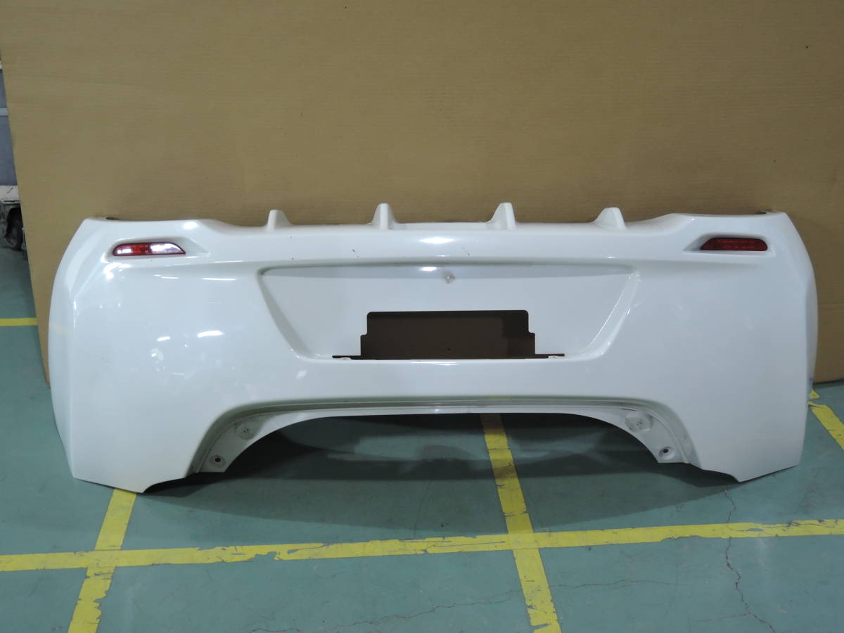 ・ ZE0 リーフ G 純正 リア バンパー スポイラー 反射板 リフレクター 白系 ホワイト N-4804拍卖