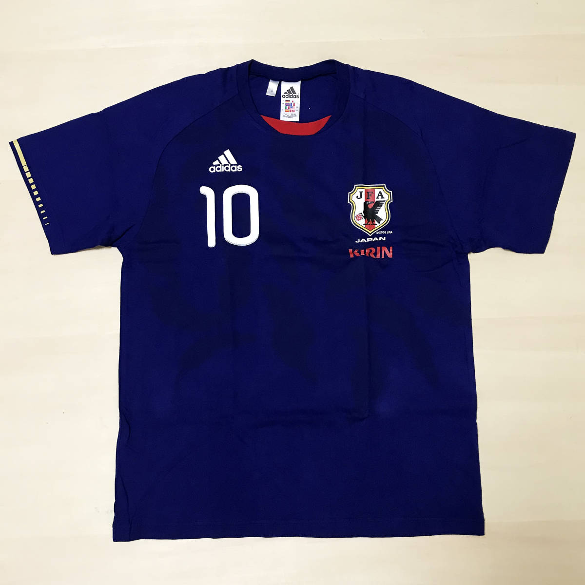 即決! 2010 10 南アフリカW杯 日本代表 ユニフォーム Tシャツ アディダス キリン 勝ちT Lサイズ 半袖 新品 非売品 応援用 炎 ドーハ 遠藤拍卖