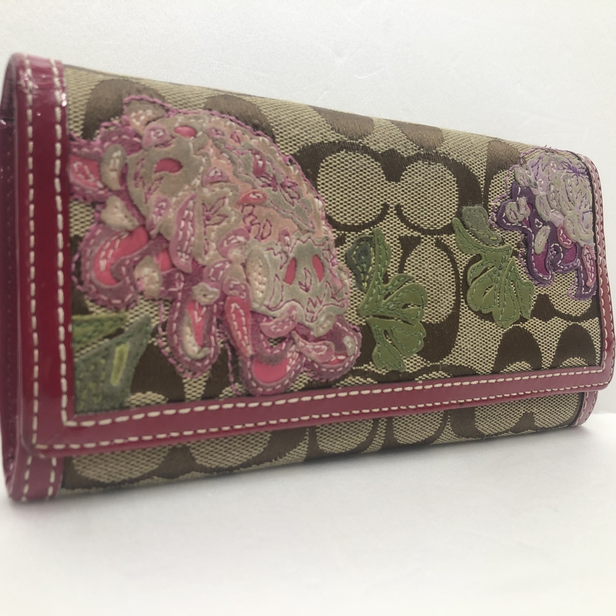 ●COACH コーチ シグネチャー 花モチーフ シグネチャー×レザー 40943 二つ折り 長財布 ピンク /N05281拍卖