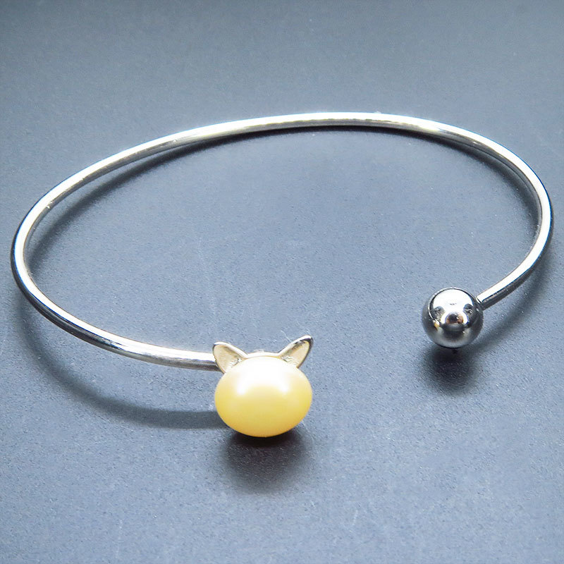 シルバー925 猫耳パールがエンドについたバングル 淡水パール(コーラルピンク) ブレスレット拍卖