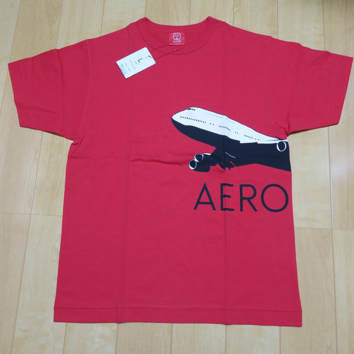 送料無料▲オジコ▲Tシャツ▲半袖▲AERO AFRO▲飛行機▲エアロアフロ▲赤/レッド▲レディース L▲未着用▲タグ付き拍卖