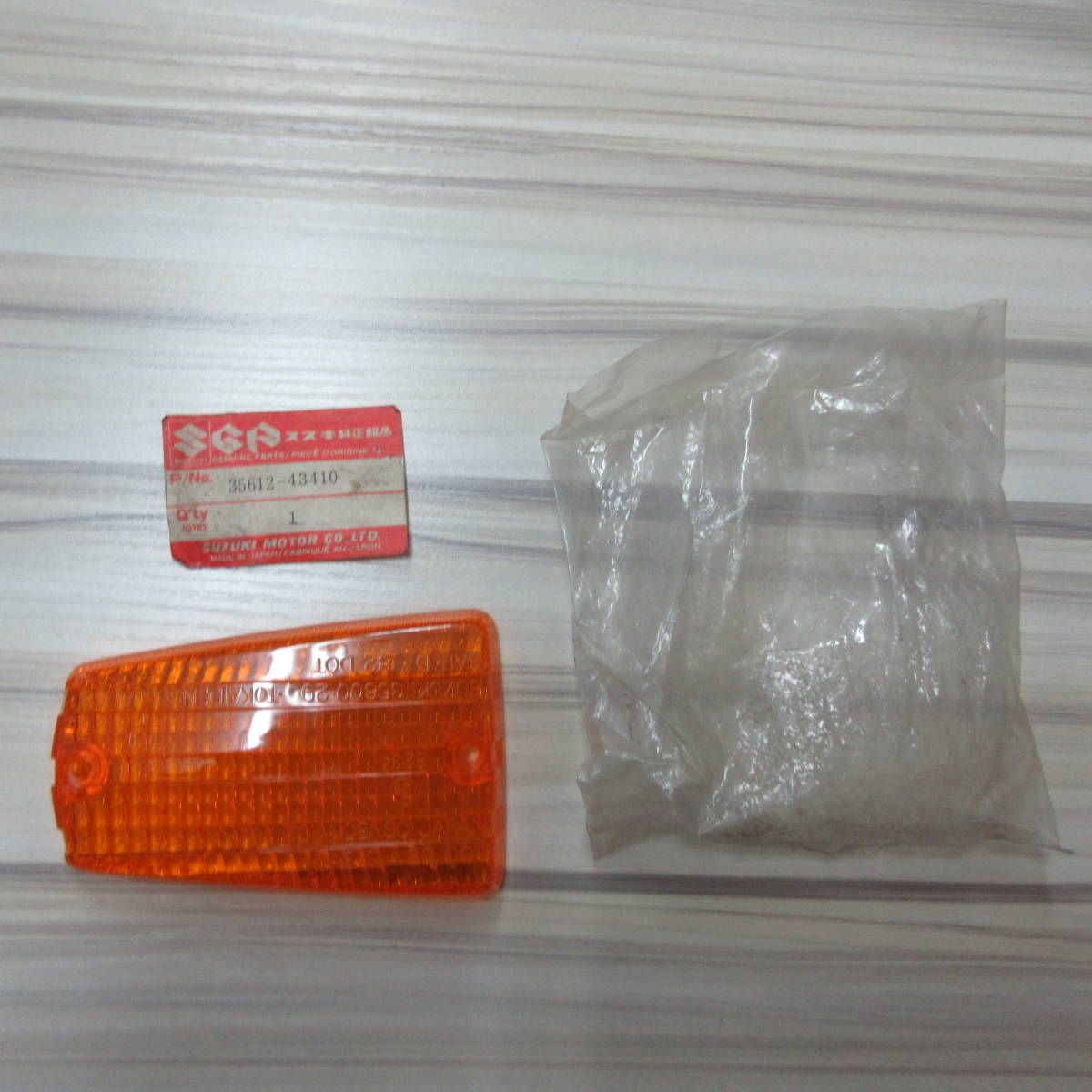SUZUKI純正部品 35612-43410 ウインカーレンズ バイク部品 パーツ 刻印SUZUKI 35600-29 TOKAIDENSO JAPAN SAE D 82 DOT拍卖