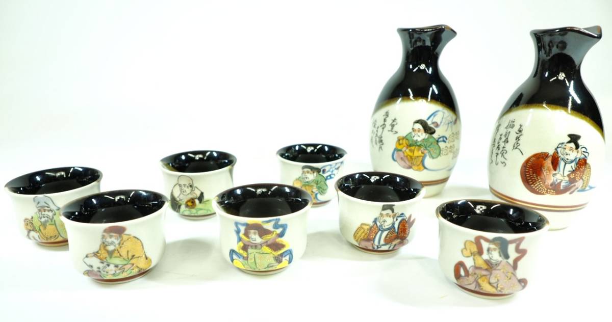 昭和ビンテージレトロ 酒器 九谷焼 陶文 徳利 直径4cm 高さ13cm お猪口 直径6cm 高さ4cm 七福神の絵柄が楽しい酒器セット拍卖