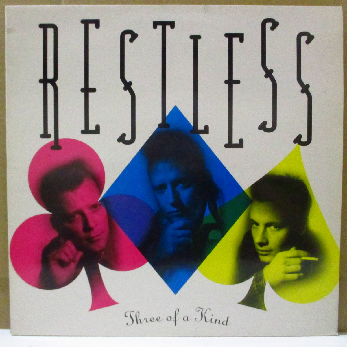 RESTLESS-Three Of A Kind (UK Orig.Pink Vinyl LP)拍卖