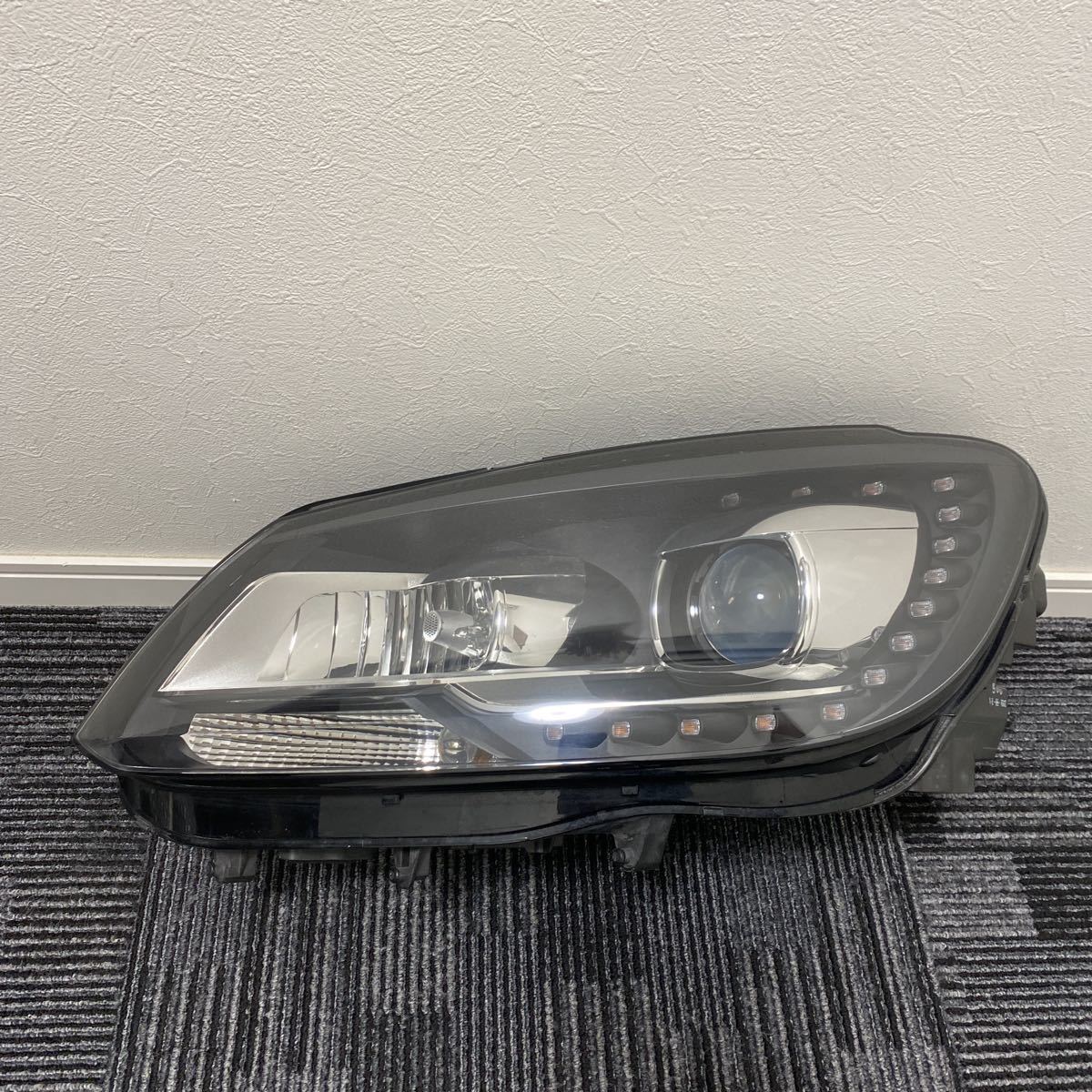 中古 フォルクスワーゲン VW ゴルフ トゥーラン ABA-1TCAV 純正 左 助手席 キセノン HID ヘッドライト拍卖