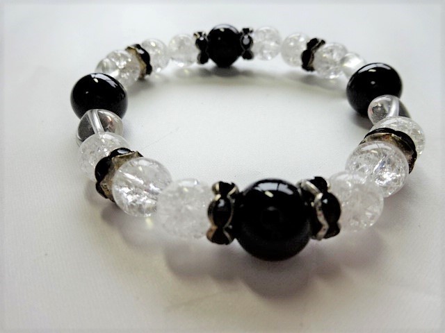 パワーストーンブレスレット オニキス・水晶<誘惑を避け、守護力を高める>西101拍卖