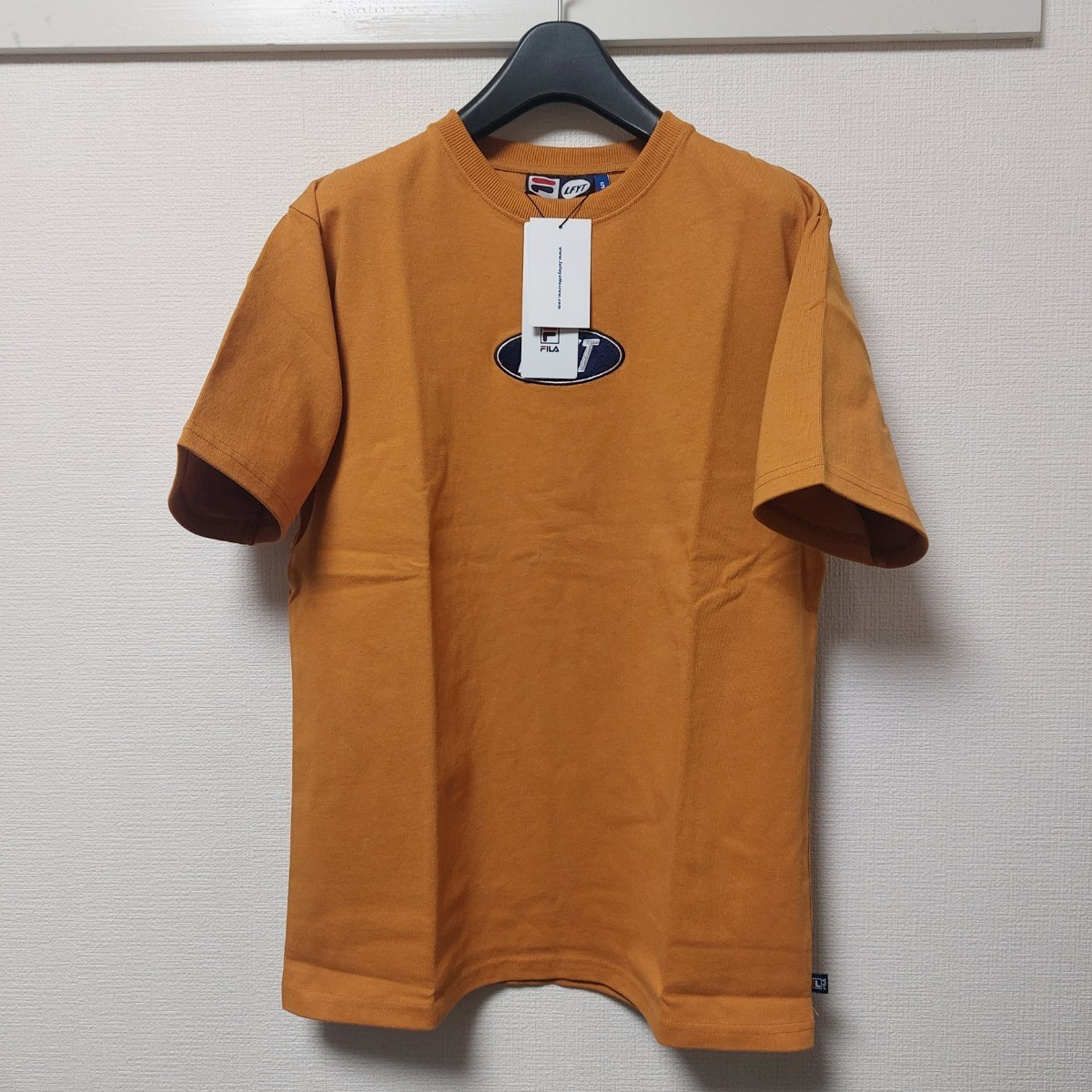 新品未使用品 定価8250円 FILA × LFYT OVAL LOGO TEE ラファイエット オレンジ サイズS 05C2403mel拍卖