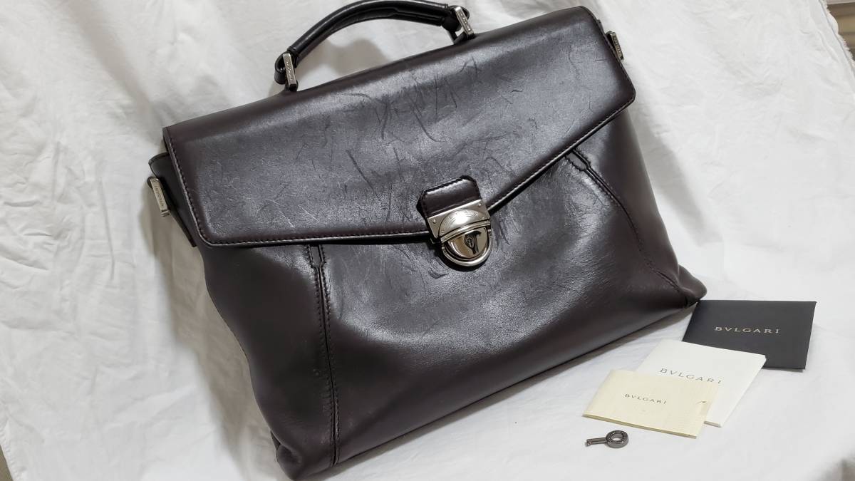 正規 ブルガリBVLGARI ラウンドロゴ金具 ビジネスバッグ 茶 クラシック ブリーフ 書類鞄 B-zeroリング 鍵有 アイコン装飾 PC収納可○メンズ拍卖