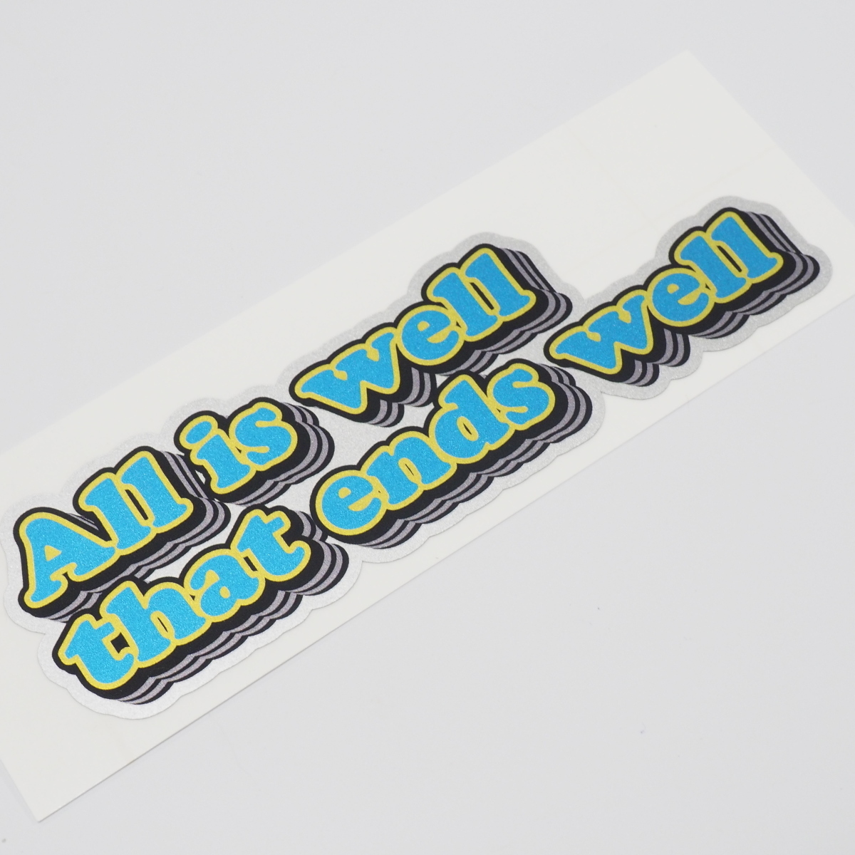 (シルバー)おもしろ ことわざステッカー あお 1枚 12cm 車 バイク(終わりよければすべてよし)メタリック 英語 アメリカン拍卖