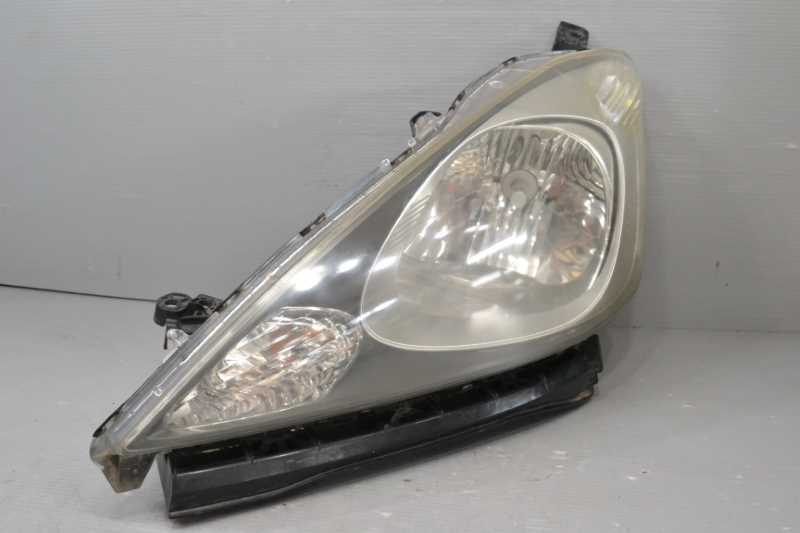 フィット G 前期(GE6) 純正 破損無 取付OK 動作保証 左 ヘッドライト ハロゲン レベライザー付 社外LEDバルブ付 33150-TF0-003 k073495拍卖