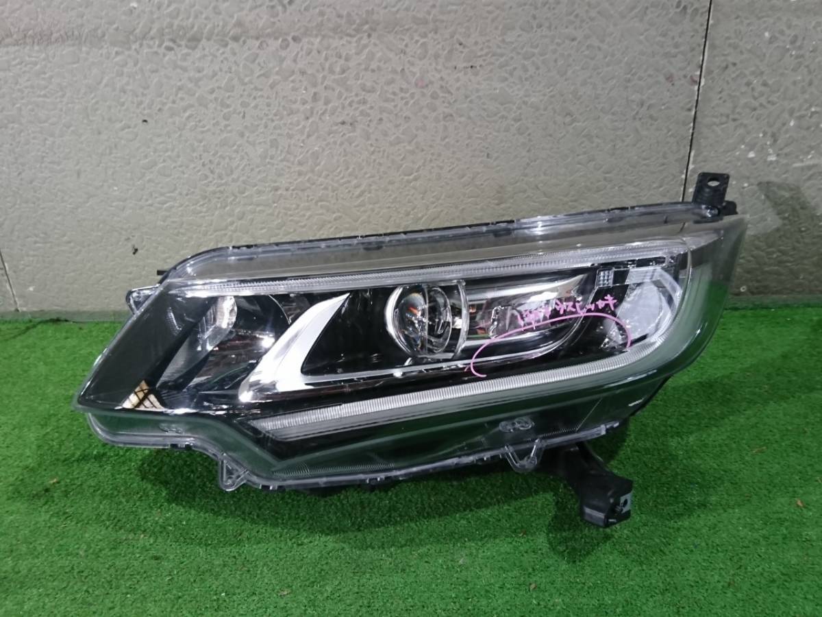 GB5 フリード 左ヘッドライト スタンレー W2172(37253)拍卖