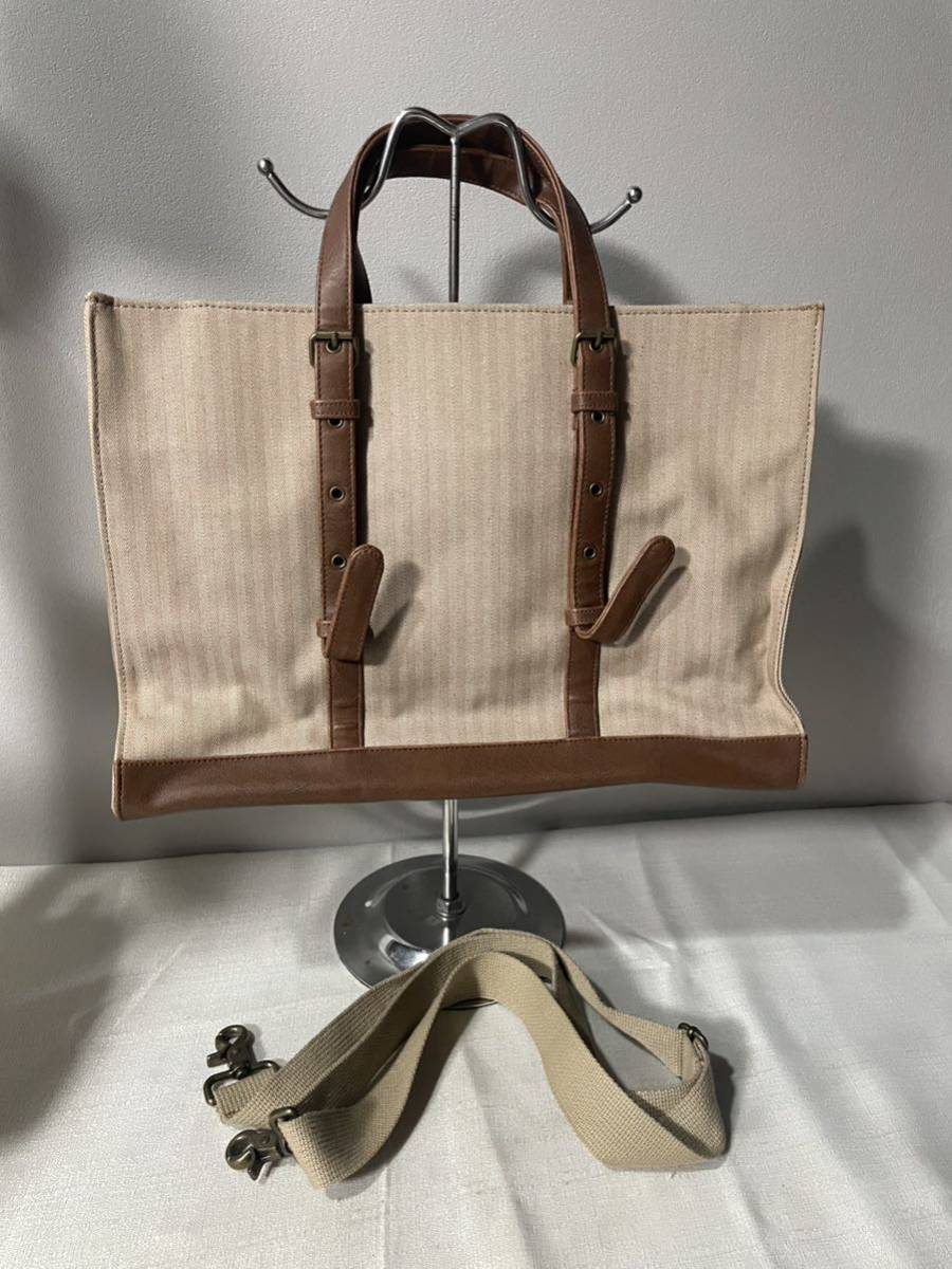 タケオキクチTAKEO KIKUCHIハンドバッグショルダー鞄茶メンズ通勤通学拍卖