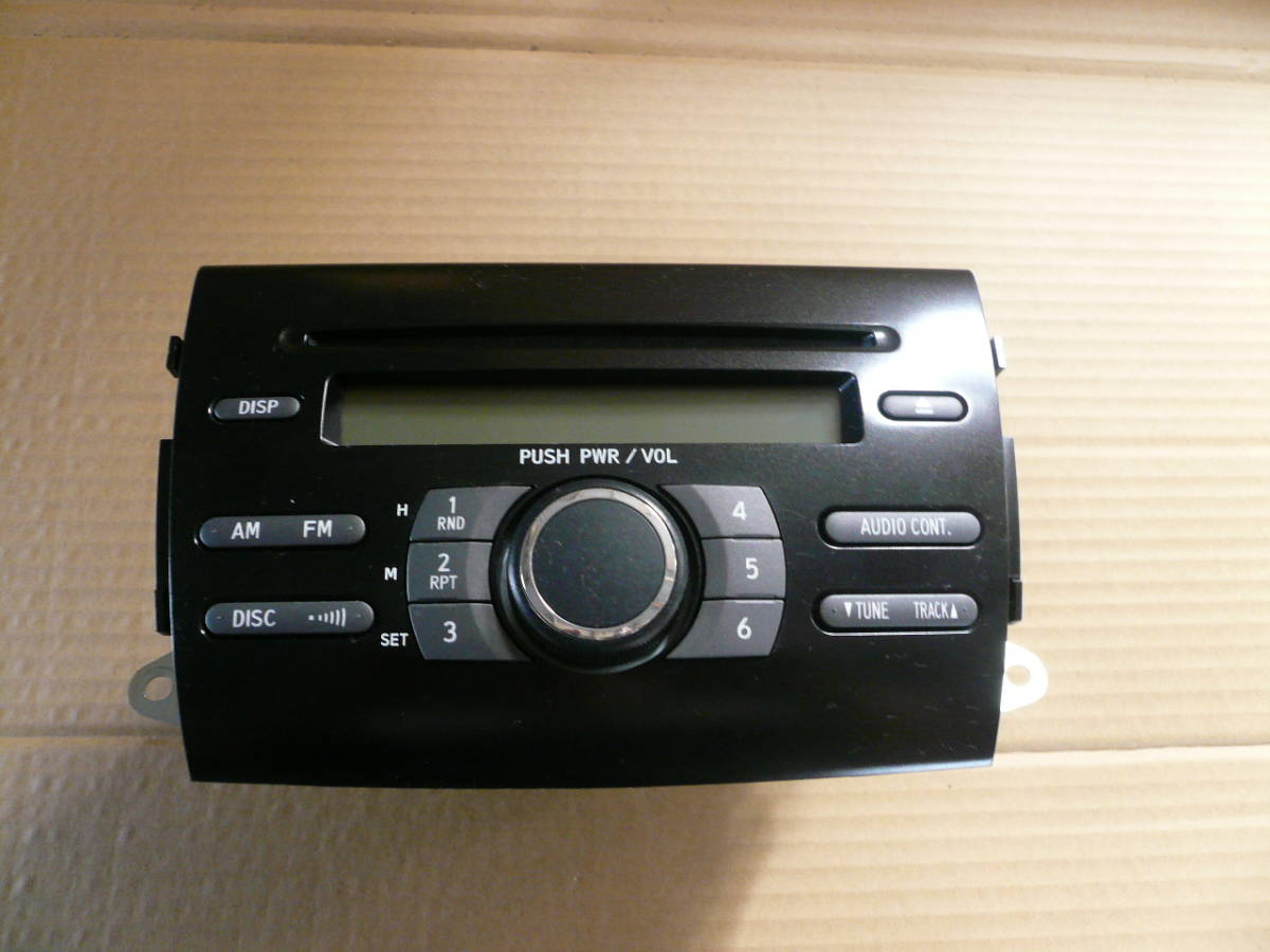 534:初期不良返品対応可!!ダイハツ 純正オーディオ CDプレーヤー AM/FMラジオ 86180-B2600 ムーヴ L175S L1850S 専用ボディ拍卖