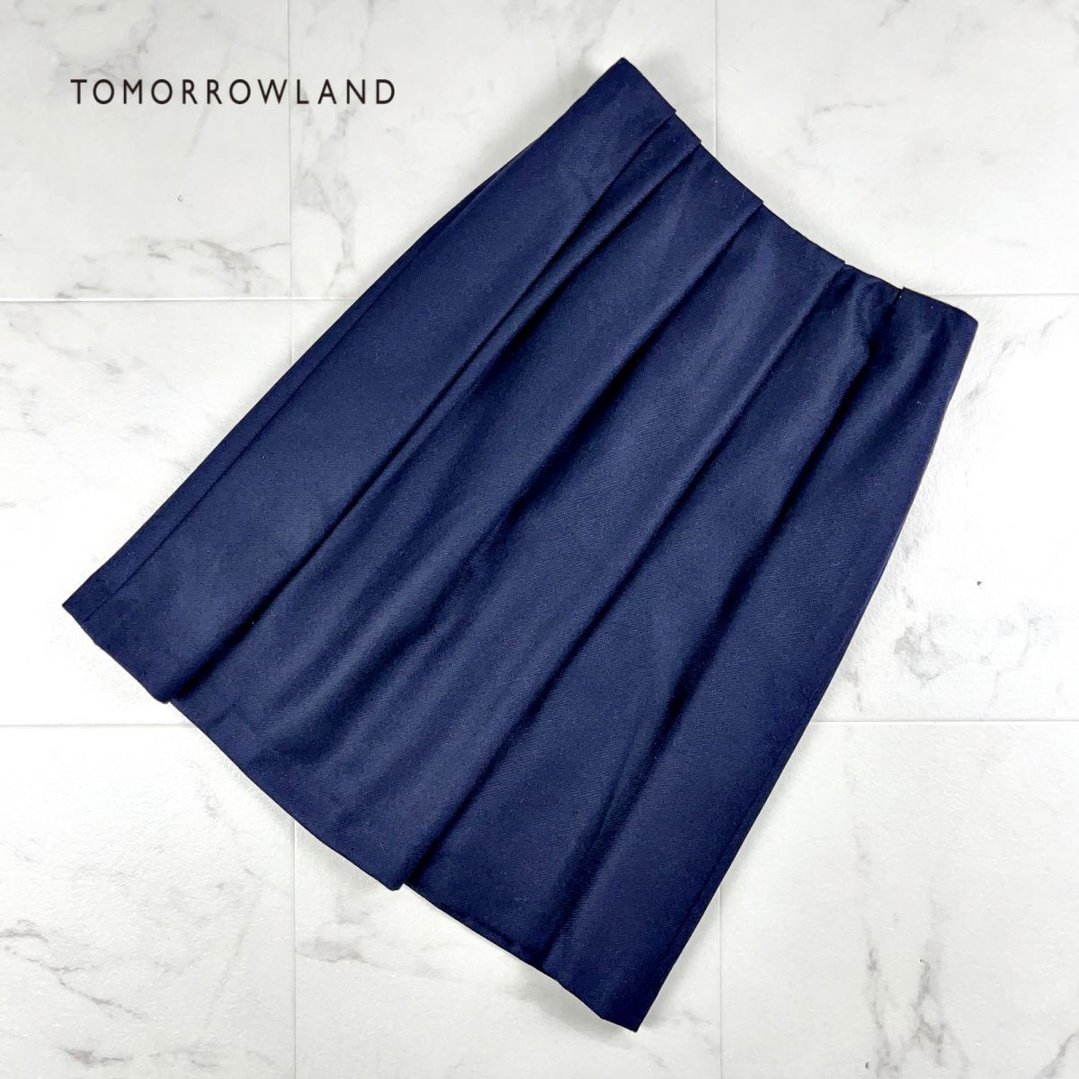 美品 TOMORROWLAND トゥモローランド ウール デザインタック フレアスカート 膝丈 裏地あり レディース ボトムス 紺 サイズ34*GC214拍卖