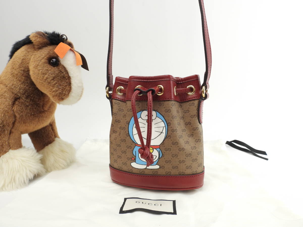 グッチ 巾着ポシェット ドラえもん マイクロGG茶赤 クロスボディバッグ 未使用@ 3拍卖
