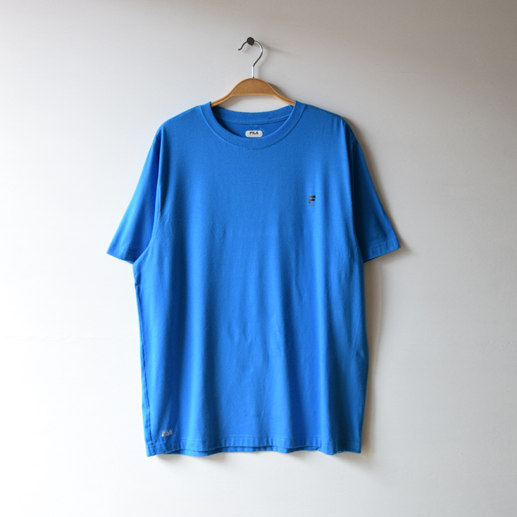 【送料無料】古着 FILA クルーネック 半袖 スポーツ Tシャツ 水色 ポリエステル/スパンデックス メンズL BB0083拍卖