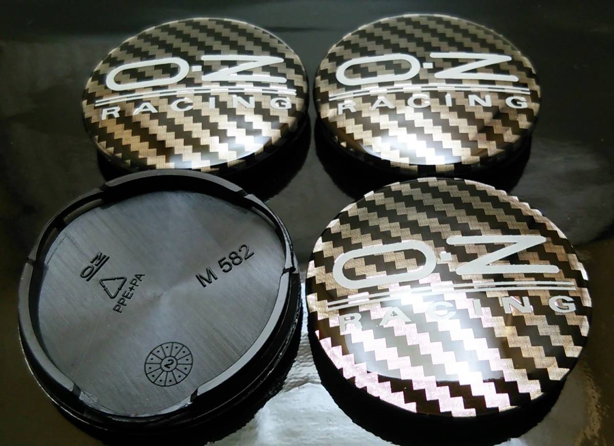 O.Z カーボン風 56mm ホイールキャップ M582 4個 E-350 エクスペディション クーガ GT エスケープ E-150 レンジャー スイフト ジュリエッタ拍卖