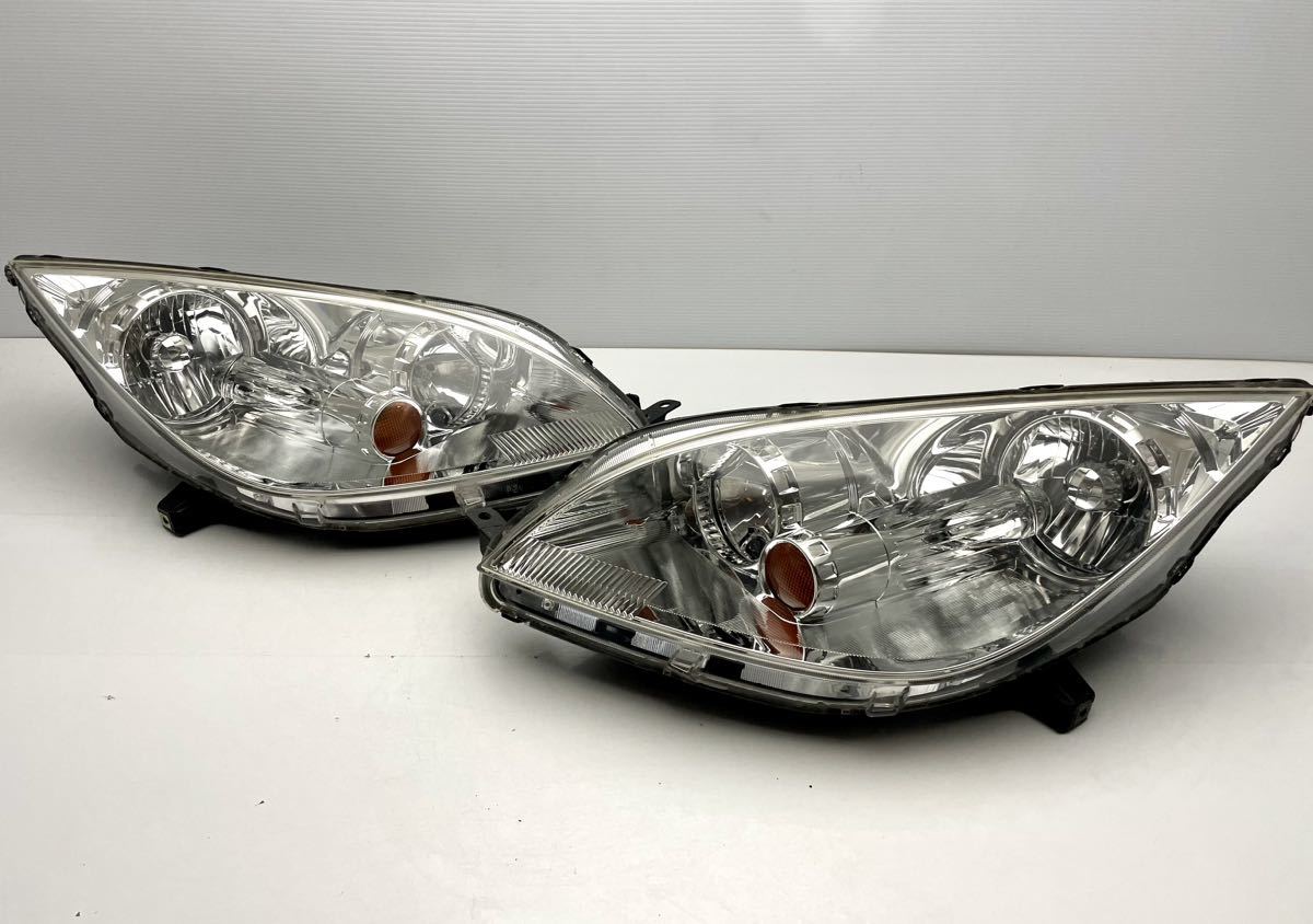 三菱 ミツビシ コルト Z21A/Z22A/Z25A/Z26A 純正 ヘッドランプ 左右 ハロゲン STANLEY P2970(W65)拍卖