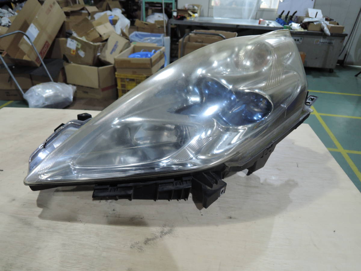 同梱不可 1円 在庫処分 点灯未確認 ZE0 リーフ G 純正 左 ヘッドライト ランプ 助手席側 バラスト付き N-6683 2410拍卖