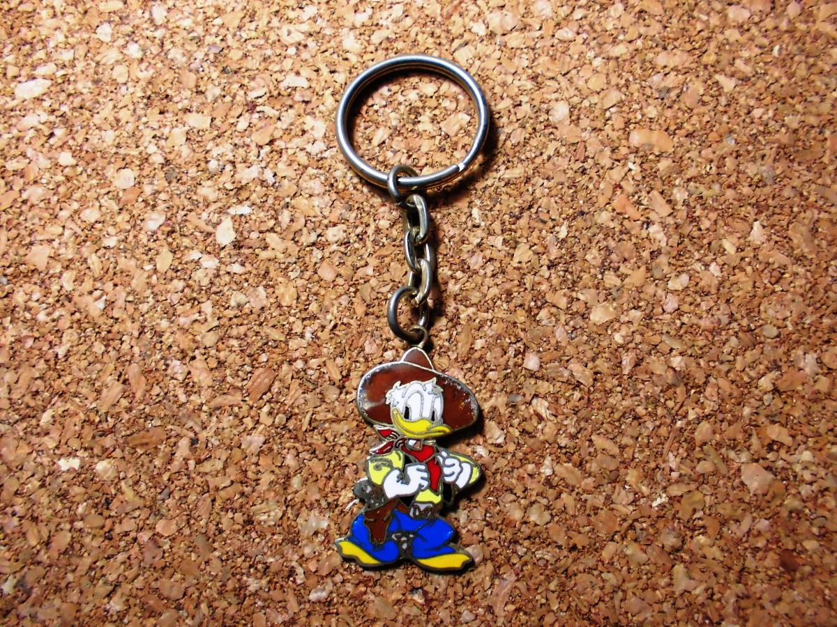 ディズニー ドナルド ダック チャーム キーホルダー アンティーク カウボーイ 保安官拍卖