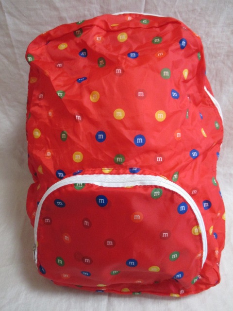 即決★M&M's エムアンドエムズ チョコレート柄 折りたたみ リュックサック/未使用拍卖