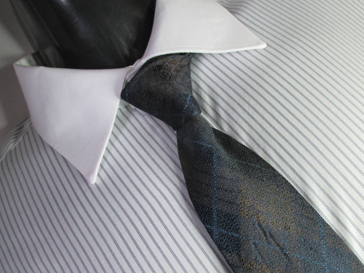 ◇クリスチャン オラーニ CHRISTIAN ORANI◇ネクタイ◇中古品◇格子の柄・茶色系◇第30弾ブランドがいっぱい◇30-110◇拍卖