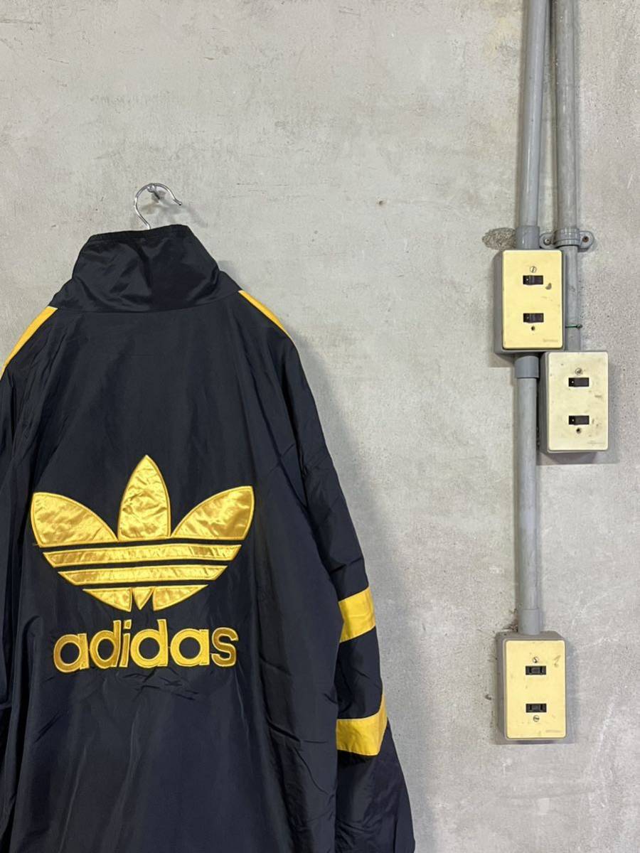 90s 90年代 adidas アディダス 黒 金 ブラック ゴールド トラックジャケット ナイロン ジャケット トレフォイル 3ストライプ タグ 古着拍卖