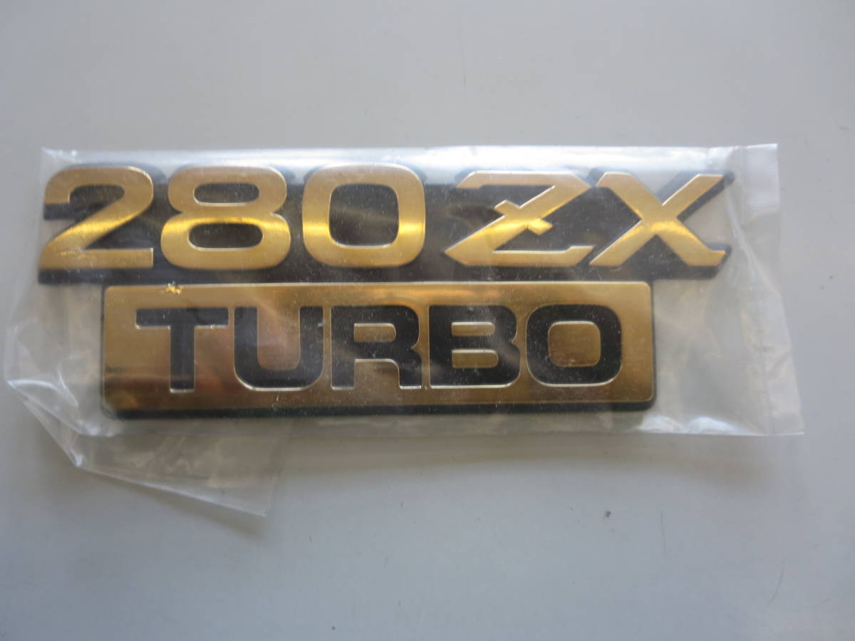 新品 280ZX TURBO フェアレディZ S130Z 純正ゴールド エンブレム 1枚 DATSUN 輸出仕様拍卖