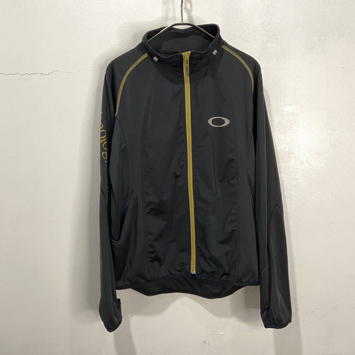 送料無料☆OAKLEY☆テックトラックジャケット☆ギミックゲームポケット☆黒☆拍卖