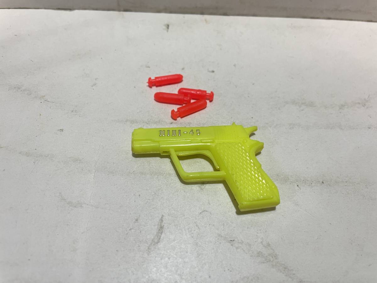 おまけ 駄玩具 ミニガン トイガン コルト45 ガチャ 香港製 拍卖