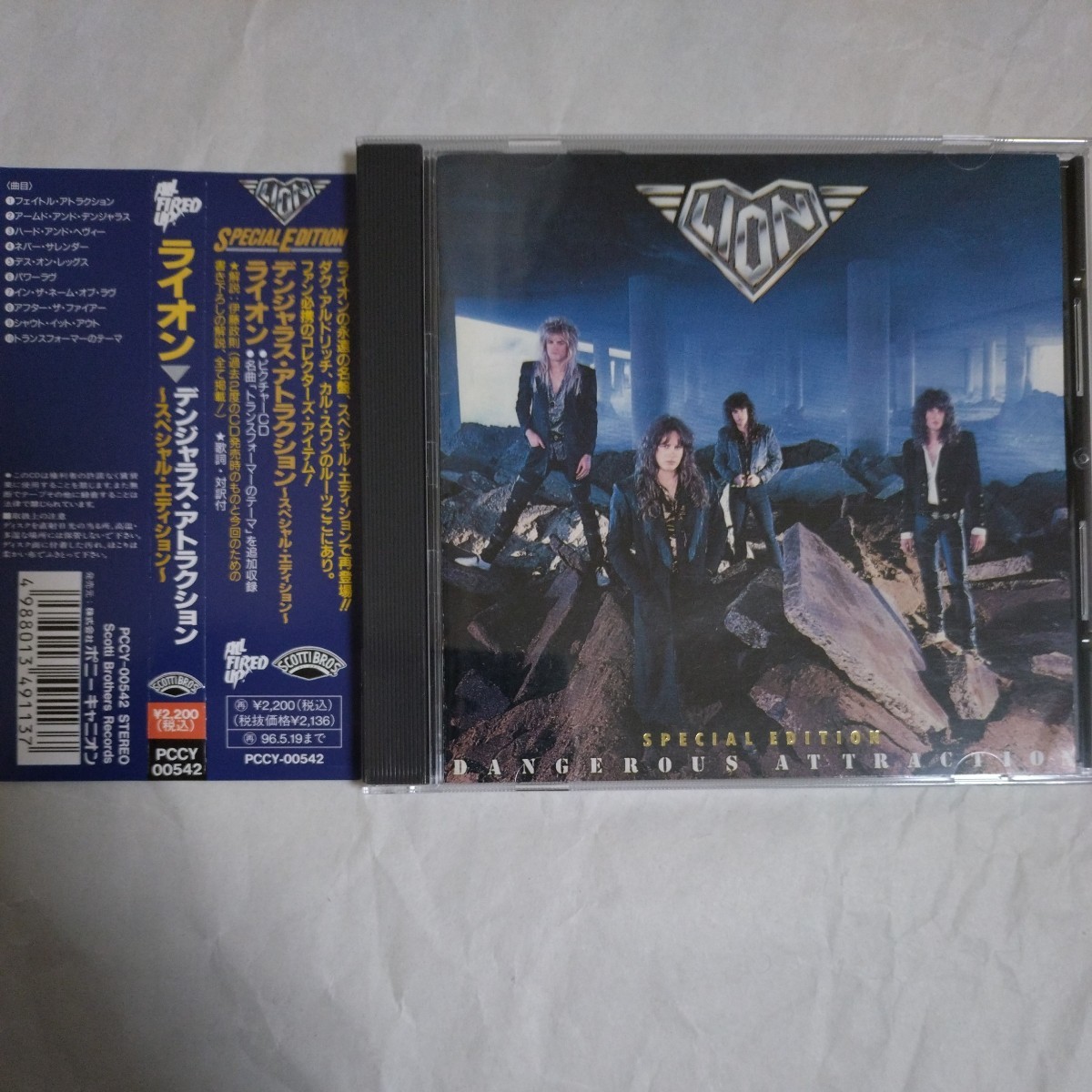94年★国内盤★帯付★LION★Dangerous Attraction★ライオン★デンジャラス アトラクション★ピクチャーCD #BAD MOON RISING #TYTAN拍卖