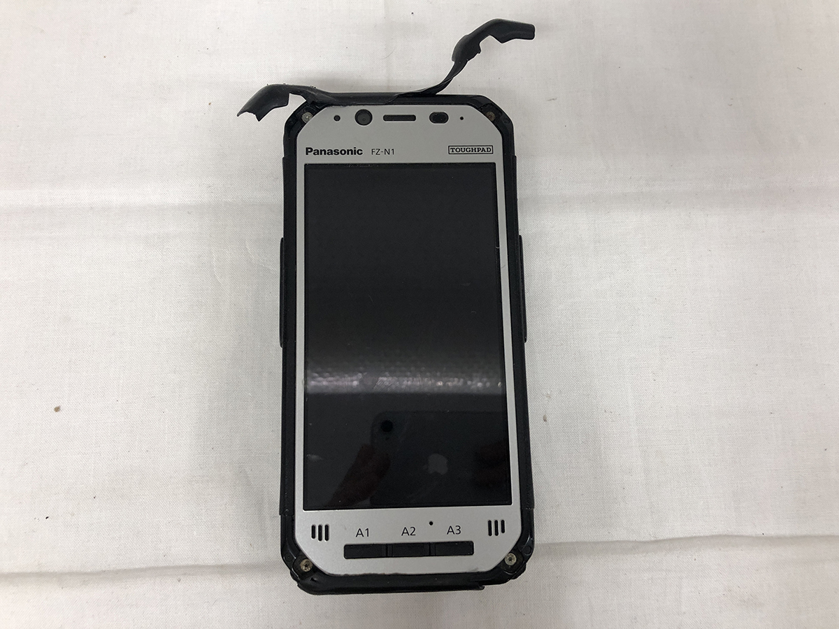 ジャンク■Panasonic TOUGHPAD FZ-N1 au版★FZ-N1CKLAAZJ★本体のみ★外装痛み★画面シミ★送料無料拍卖