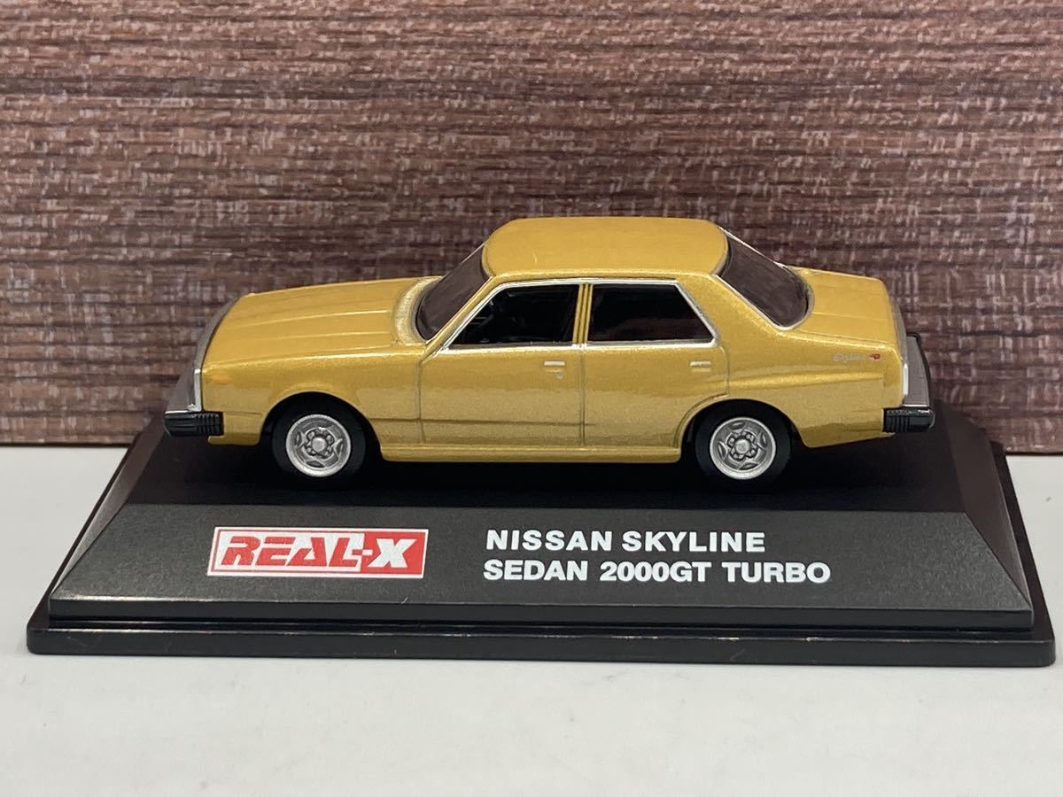 即決有★REAL-X 1/72 NISSAN SKYLINE SEDAN 2000GT TURBO 日産 スカイライン セダン C211 ジャパン 金 ゴールド★ミニカー拍卖