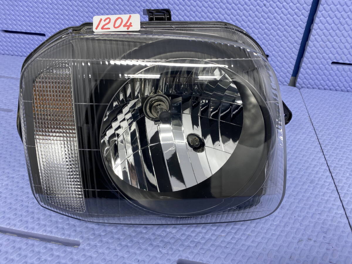1204 * ジムニー JB23W ヘッドライト 右 コイト 100-32647 100-32081 ハロゲン レべライザー無拍卖