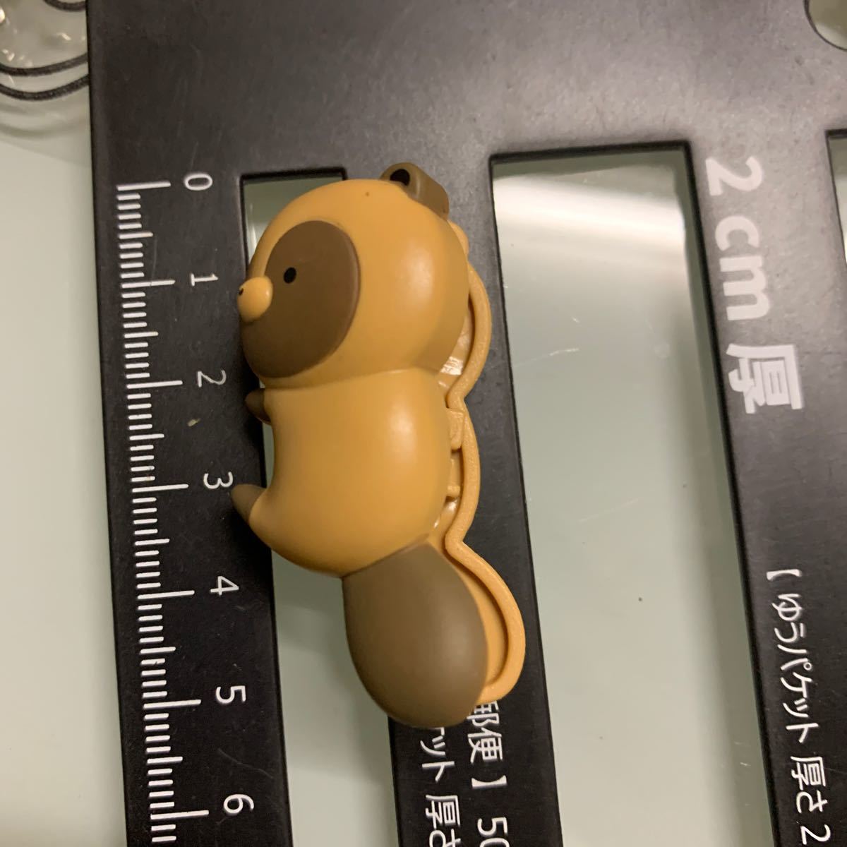 しがみつくタヌキ 「タヌキとキツネはさむんです。」拍卖