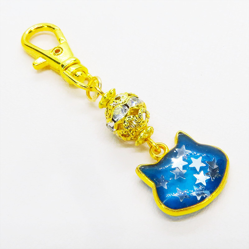 ブルーキャットスターキーホルダー ゴールドカラー 青い猫フェイスに星を散りばめたキーホルダー メタルビーズ拍卖