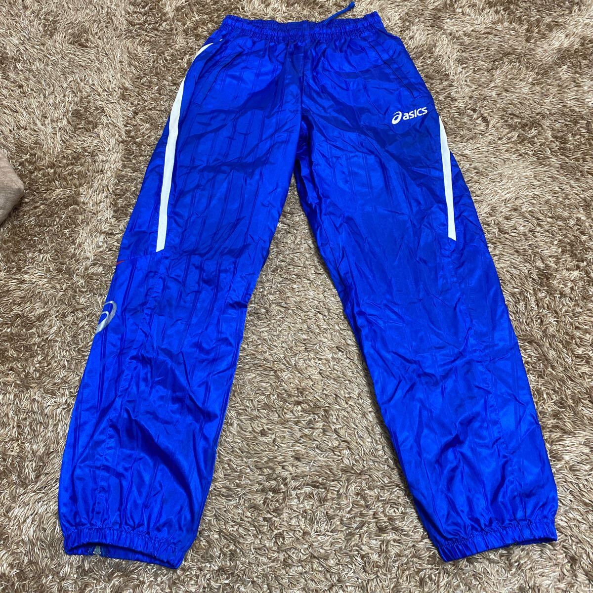 t65 asics シャカシャカパンツ サイズM表記 中国製拍卖